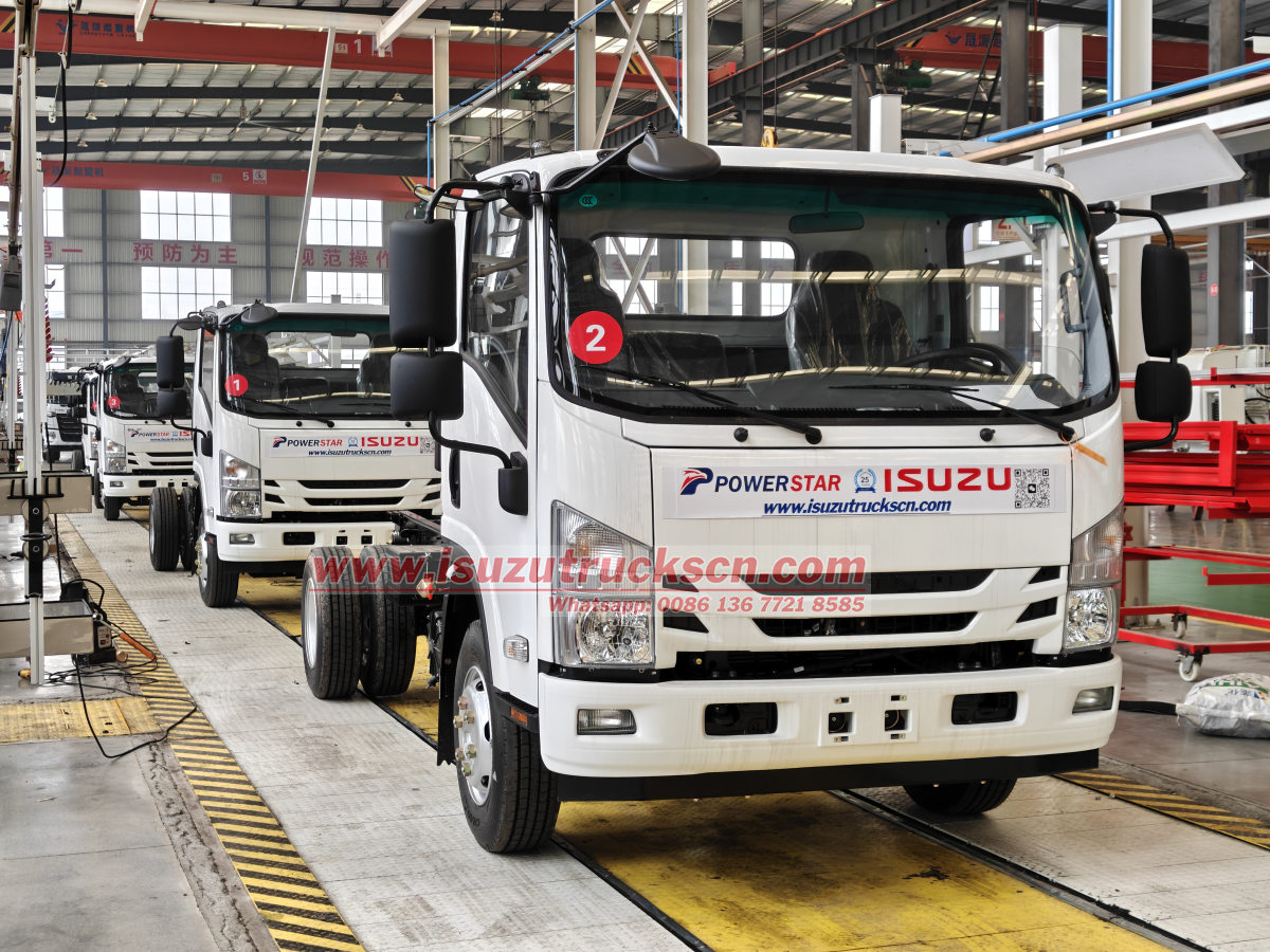 4 units Isuzu NPR 10Tons Hooklift Container Truck in Powerstar trucks workshop